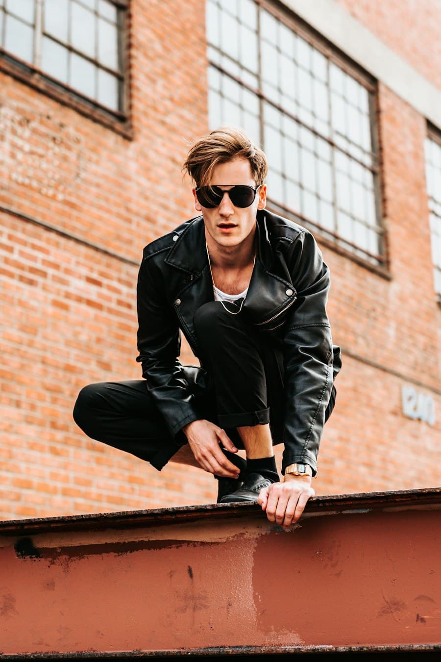 Man in a black leather jacket, editorial street style